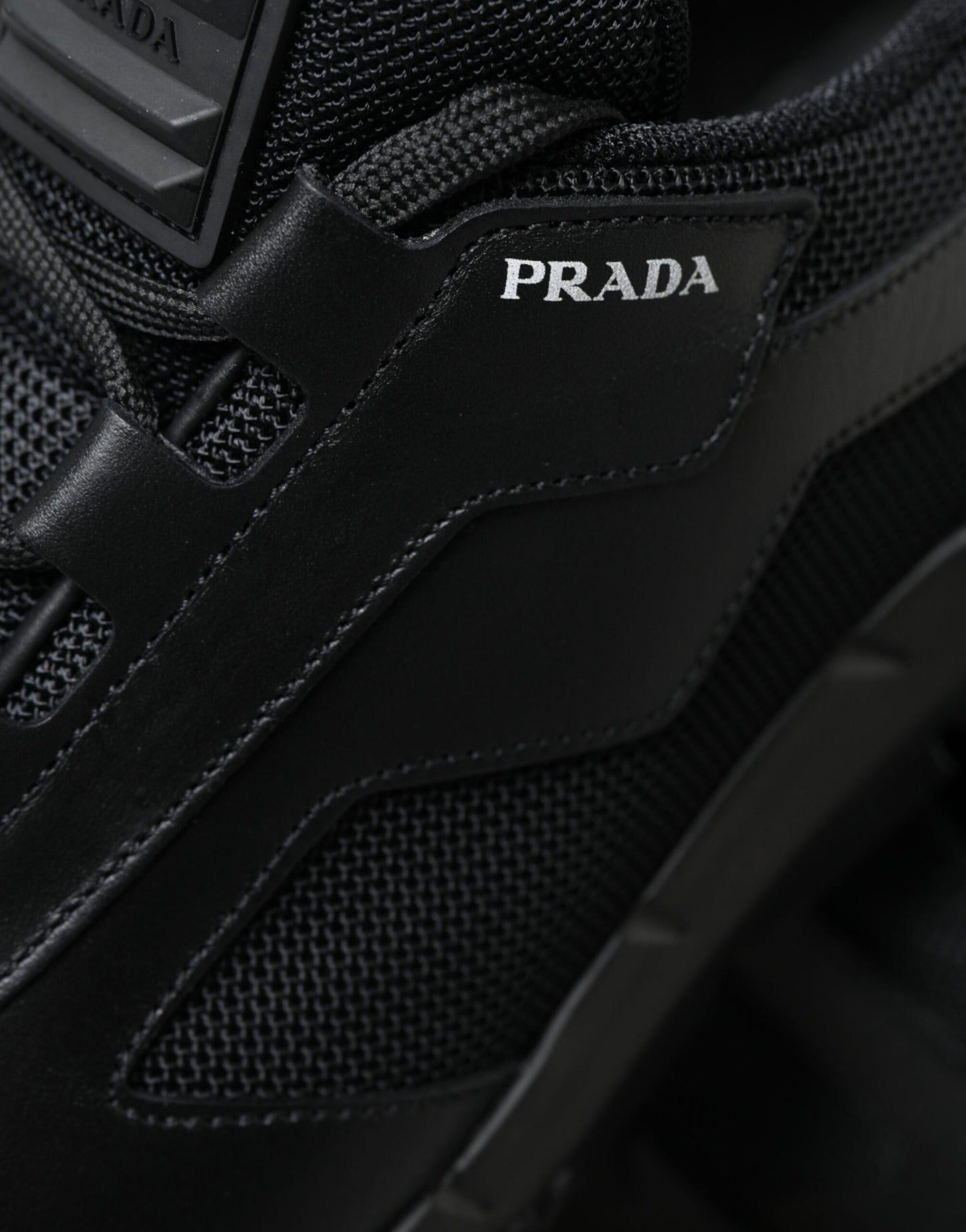 Prada Sleek Low Top Leather Sneakers in Timeless Black