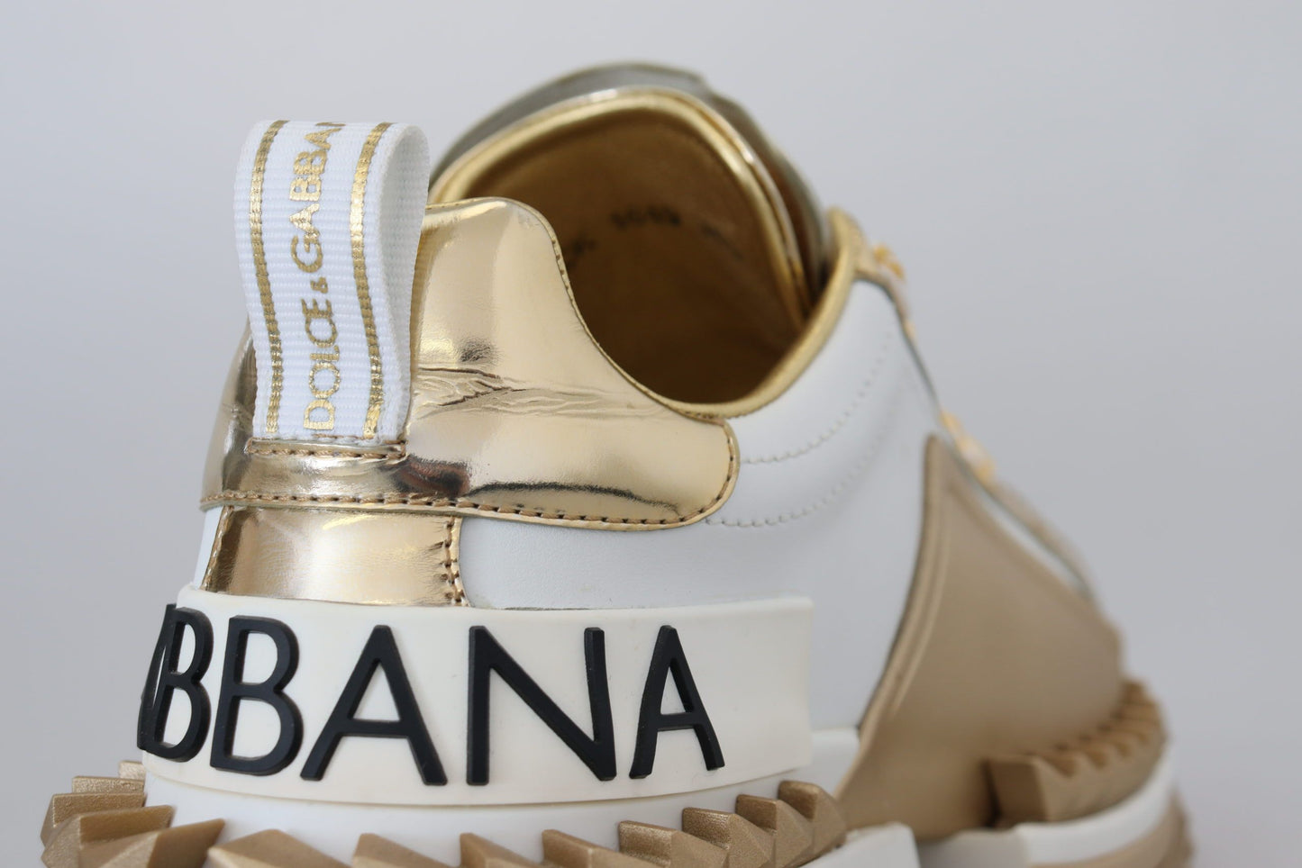 Dolce & Gabbana Elegant White and Gold Leather Sneakers